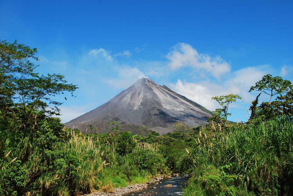 Arenal-National-Park-with-blue-sky-and-volcano